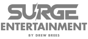 logo of surge entertainment grey color